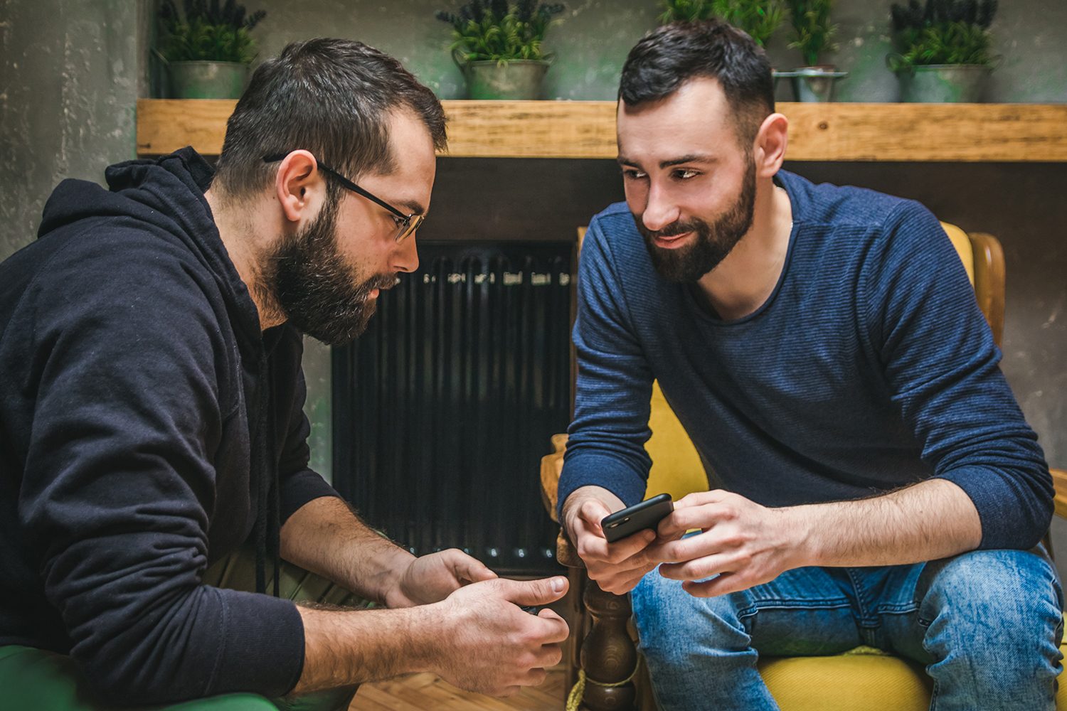 Two Friends Watching Content In A Smart Phone