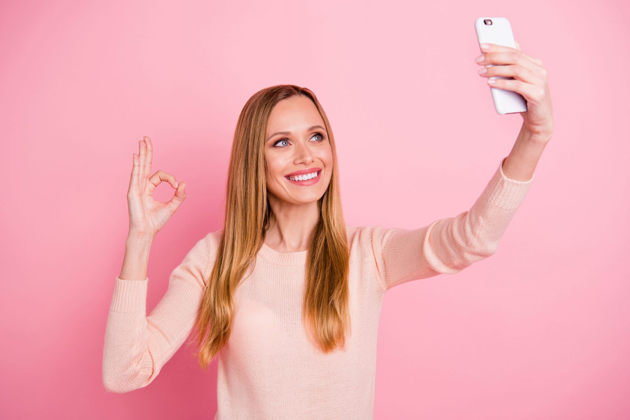 Gen Z influencer taking a selfie