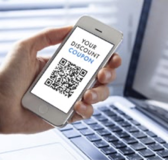 A hand holding a smartphone that displays a discount coupon with a QR code