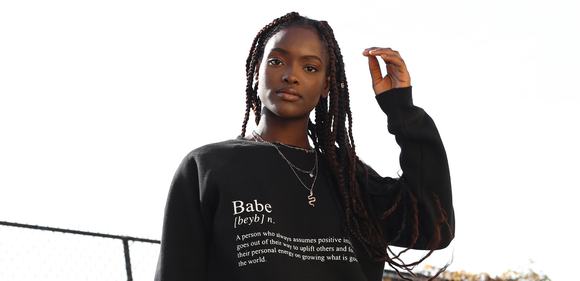 A model wearing a Brunette the Label sweatshirt