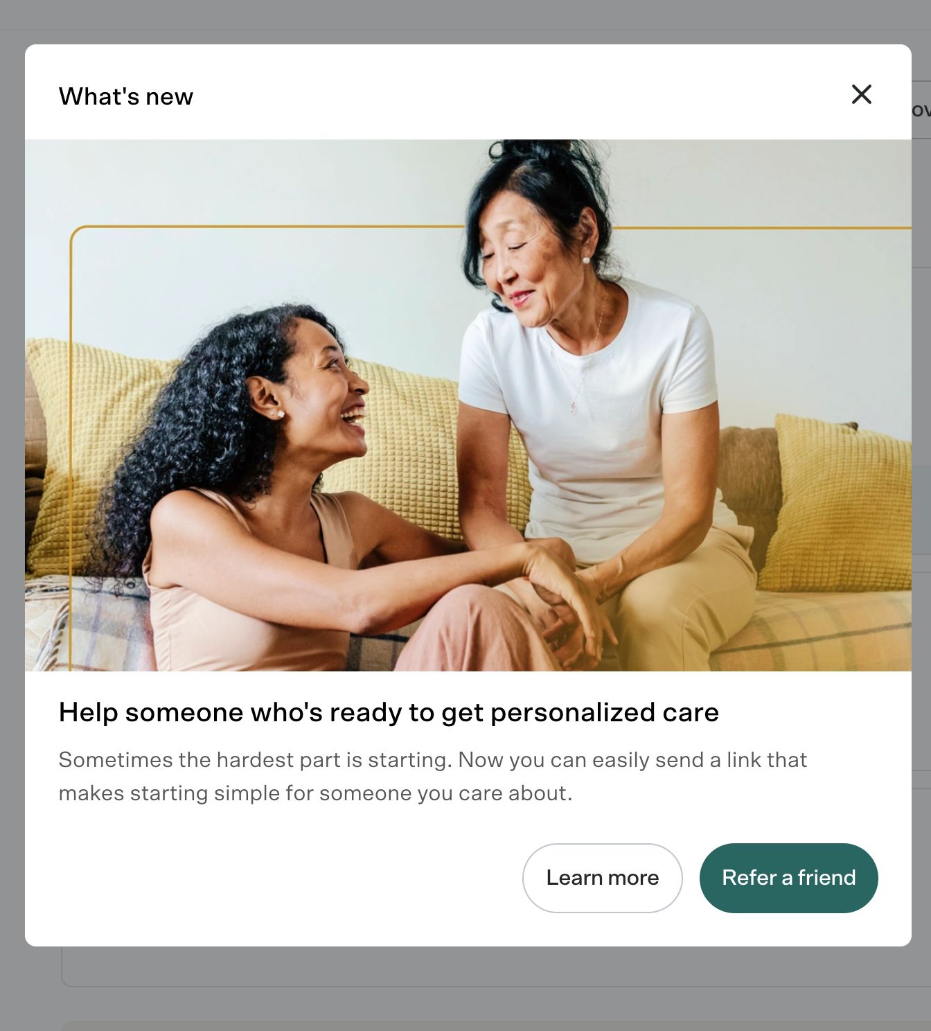 Rula referral program example showing two women talking on a couch, alongside messaging that encourages users to refer a friend to access personalized care more easily.